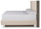 Anibecca Queen Upholstered Panel Bed with Mirrored Dresser and Chest