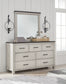 Darborn King Panel Bed with Mirrored Dresser, Chest and 2 Nightstands