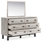 Vessalli King Panel Bed with Mirrored Dresser and Nightstand