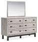 Vessalli Queen Panel Bed with Mirrored Dresser and Chest